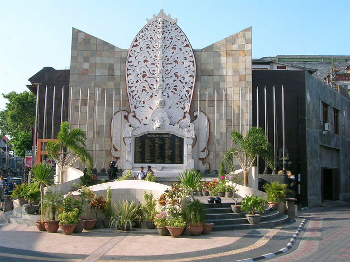 Monument surrounded by plants in a public square, illustrating key events from the year you were born from 1960 to 2010.