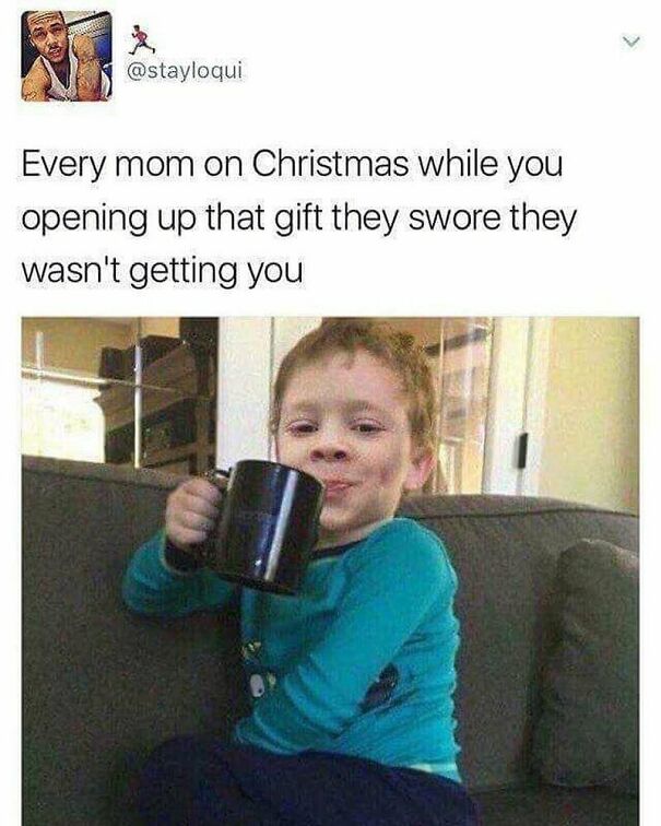 Wholesome posts meme of a child smirking while holding a mug, depicting a mom on Christmas when a child opens a surprise gift.