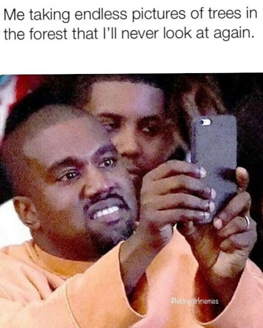 Man awkwardly taking photos on his phone, humorously depicting camping and hiking memes about nature photography.