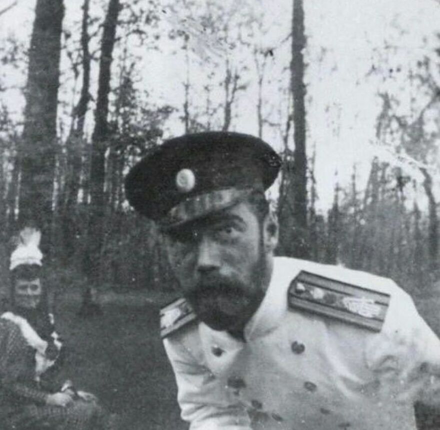 Fascinating photos teach history: Black and white photo of a bearded man in a military uniform and cap, another figure in background.