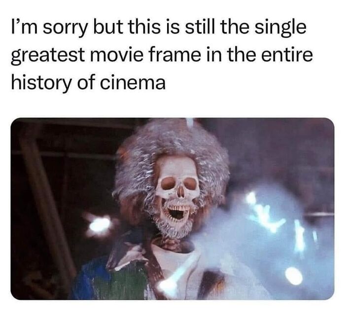 90s meme showing a skeleton with afro hair and a caption praising the greatest movie frame in cinema history.