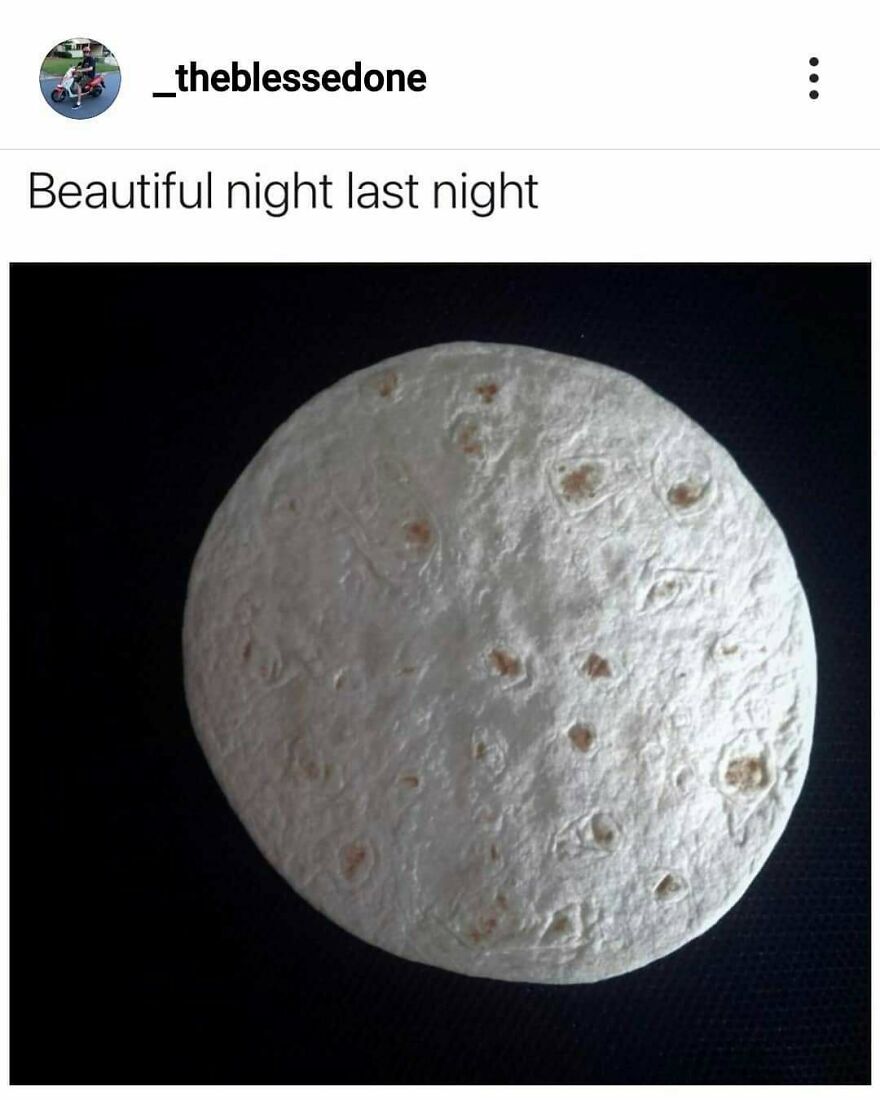 Round tortilla on a dark background resembling a moon, camping and hiking memes humor about nature connection.