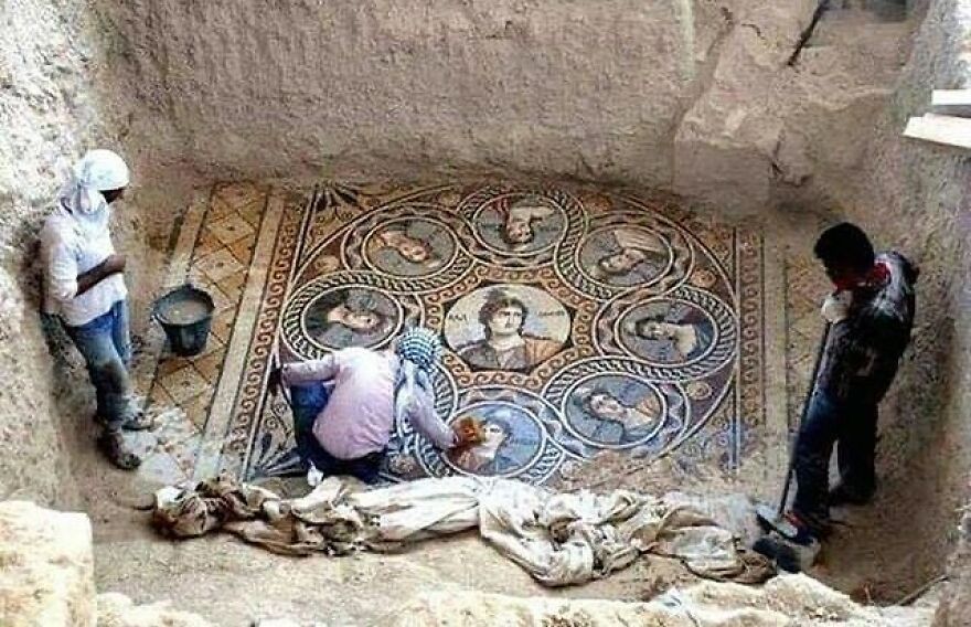Archaeologists uncover a stunning ancient mosaic floor depicting busts in circles, offering fascinating photos about history.