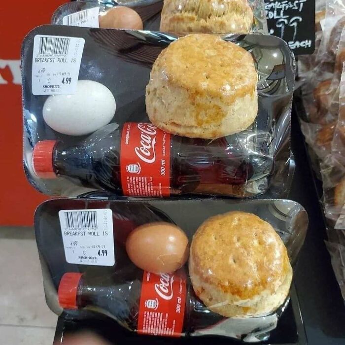 A cursed image of strange breakfast combos: a biscuit, egg, and Coke, plastic-wrapped together for 4.99.