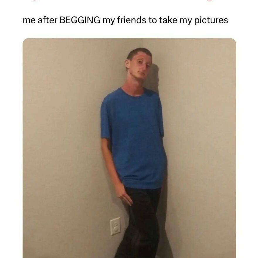 A funny meme of a man in a blue shirt and black pants leaning awkwardly in a corner. Relatable memes to distract you.