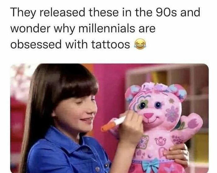 Girl drawing on a 90s pink teddy bear toy, highlighting nostalgia with popular 90s memes and cultural references.