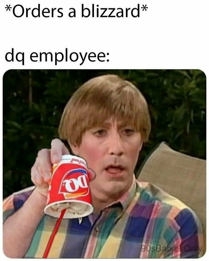 Man in a colorful plaid shirt holding upside-down Dairy Queen cup, vintage ’90s meme from nostalgia ride collection.