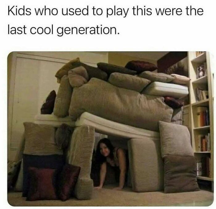 Woman crawling out of a couch fort, a nostalgic scene from 90s memes that sparks a wild and amazing nostalgia ride.