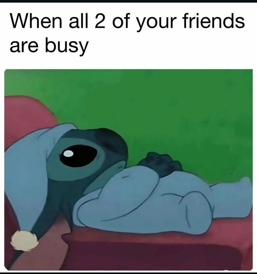 A funny and relatable meme of Stitch from Lilo & Stitch looking bored and lonely, wearing a blue nightcap.