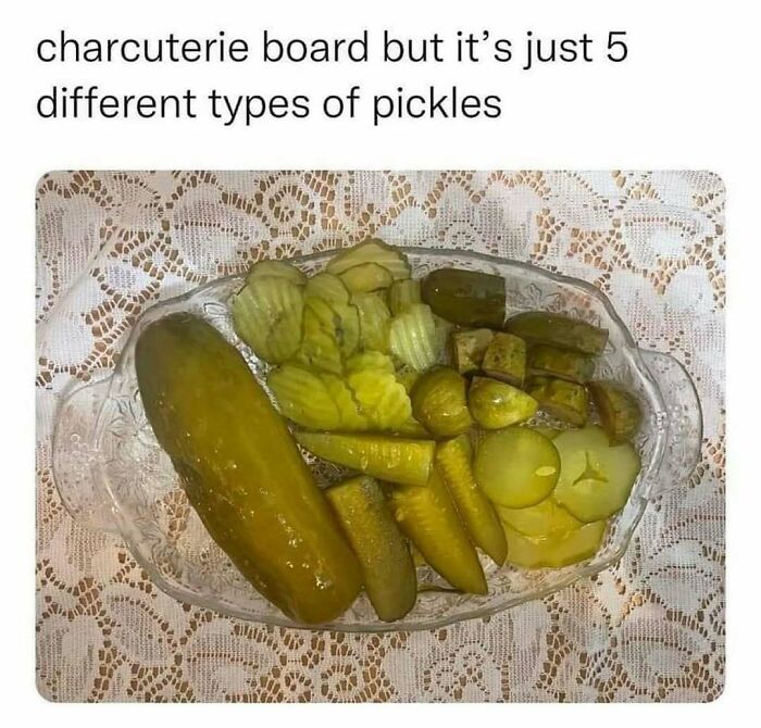 Charcuterie board parody with five different types of pickles displayed on a glass dish, a wild meme for the day.