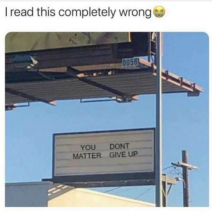 Sign with split words reading "YOU DONT MATTER GIVE UP" humorously misread, featured in wild memes to brighten your day.