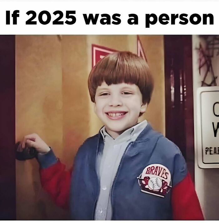 Boy with a retro 90s hairstyle smiling and wearing a Braves jacket, representing memes from the ’90s nostalgia.