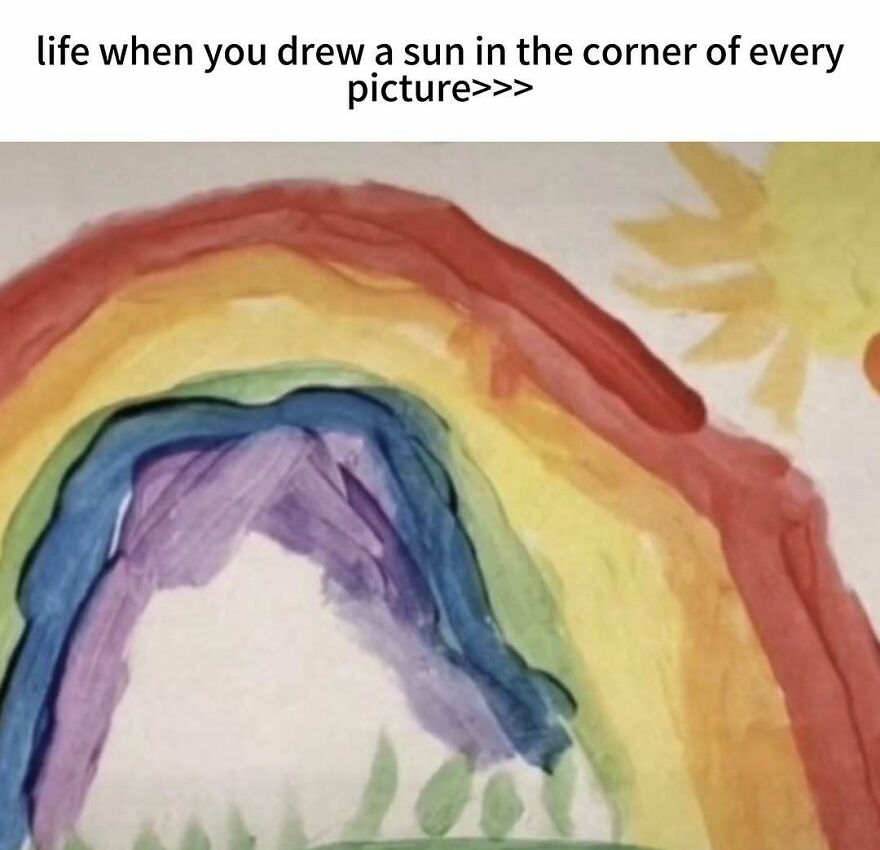 A nostalgic photo captures the vibe of growing up in the 2000s, featuring a child's painting of a rainbow and sun.