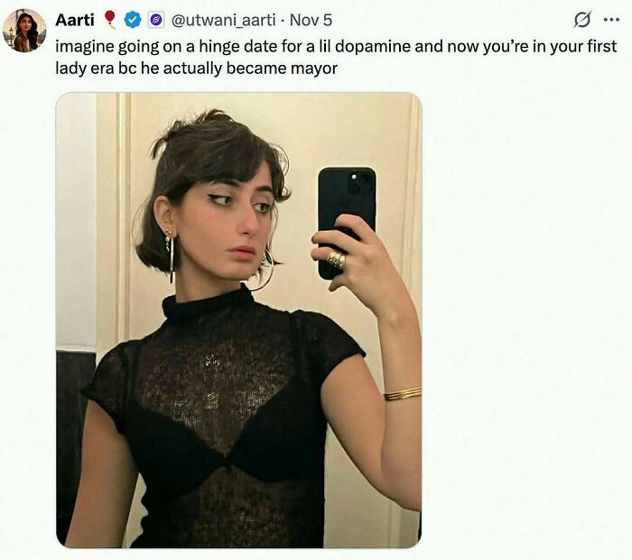 Social media post with a woman taking a mirror selfie, part of unhinged and wild memes that might make your day better.