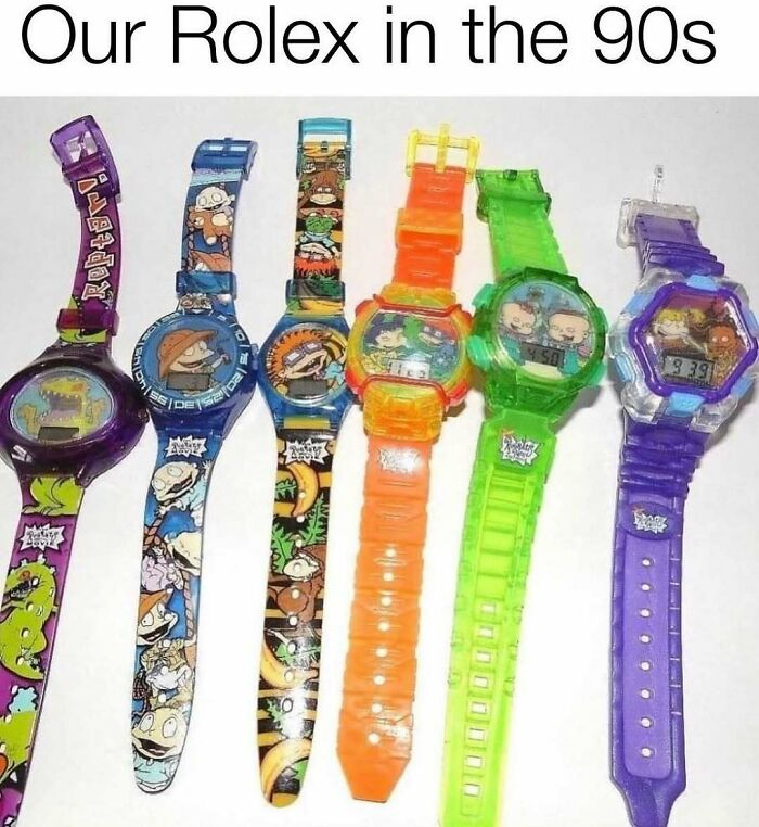 Colorful 90s cartoon-themed digital watches representing ’90s memes and nostalgia from the 97 memes collection.