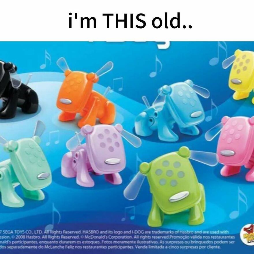 A collection of colorful I-Dog toys for 2000s kids, against a blue background with musical notes. Nostalgic photos.