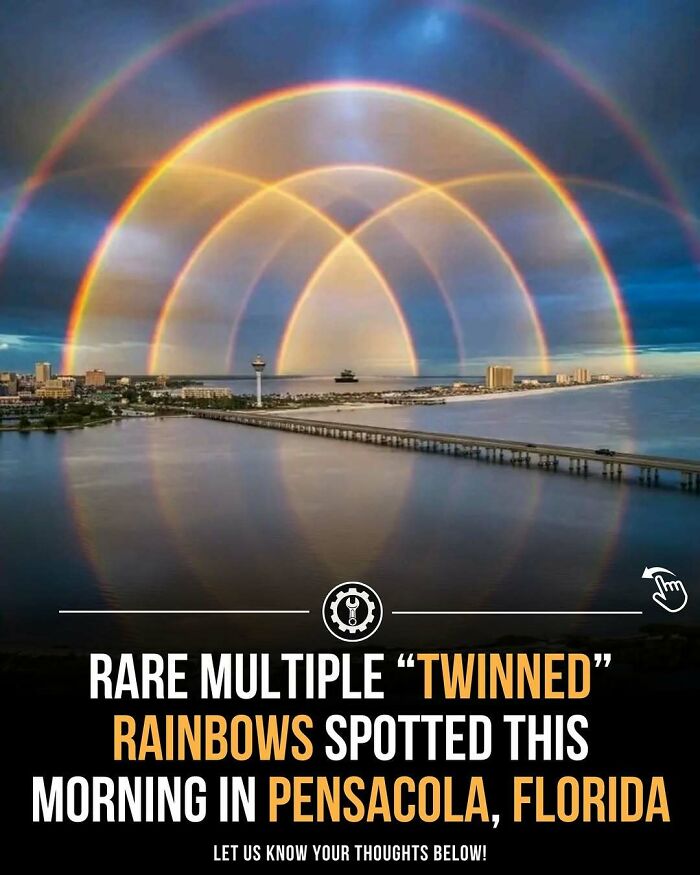 Rare multiple twinned rainbows over a coastal city, showcasing how everything is made through natural light refraction.