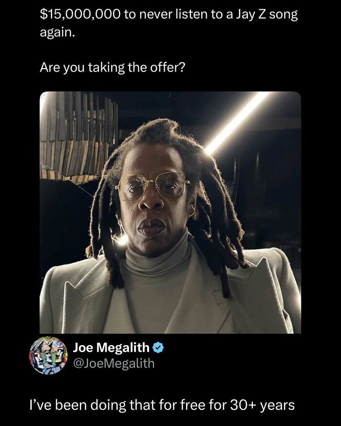 Man with dreadlocks and glasses in a light blazer featured in funny and interesting posts to brighten your day.