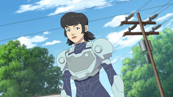 Animated character Tech Jacket in invincible season 4 wearing futuristic armor outdoors near trees and power lines