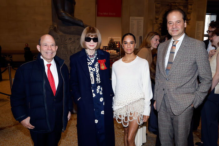 Four people posing, including Anna Wintour, discussing the Met Gala 2026 Dress Code and Theme.