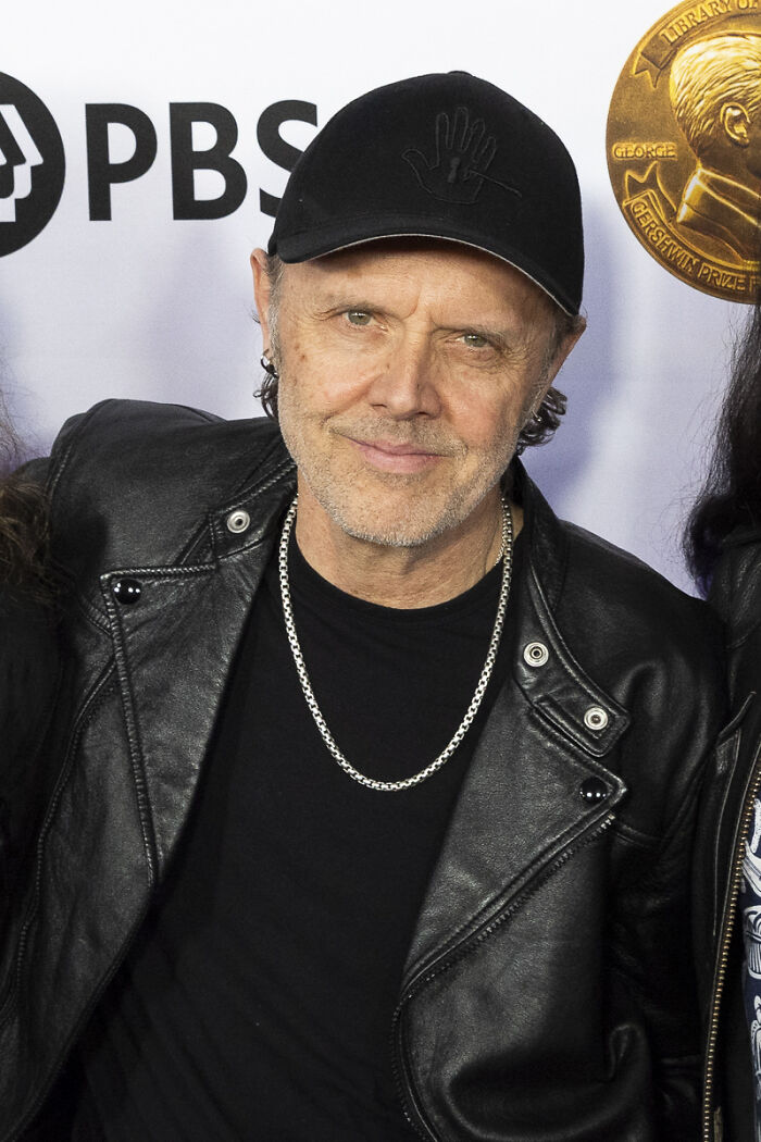 Man wearing a black leather jacket and cap at an event, illustrating common PR mistakes companies didn’t expect to backfire.