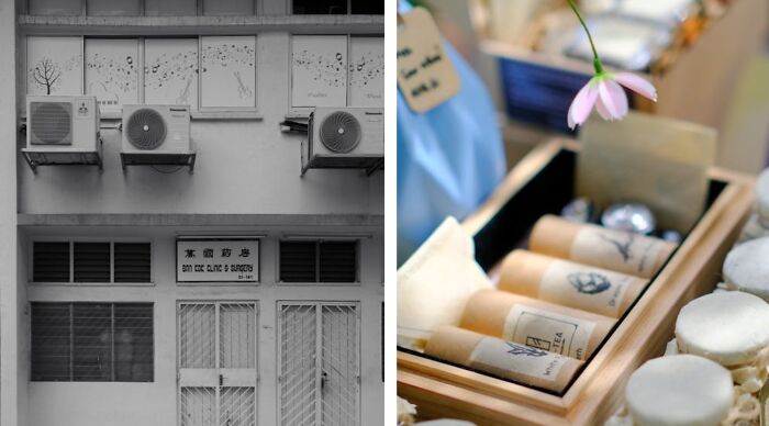 Black and white building facade with air conditioners contrasted with colorful gift box packaging.