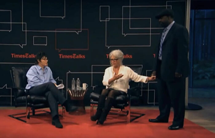 Three people in a discussion on stage with TimesTalks backdrop, illustrating common PR mistakes companies face.
