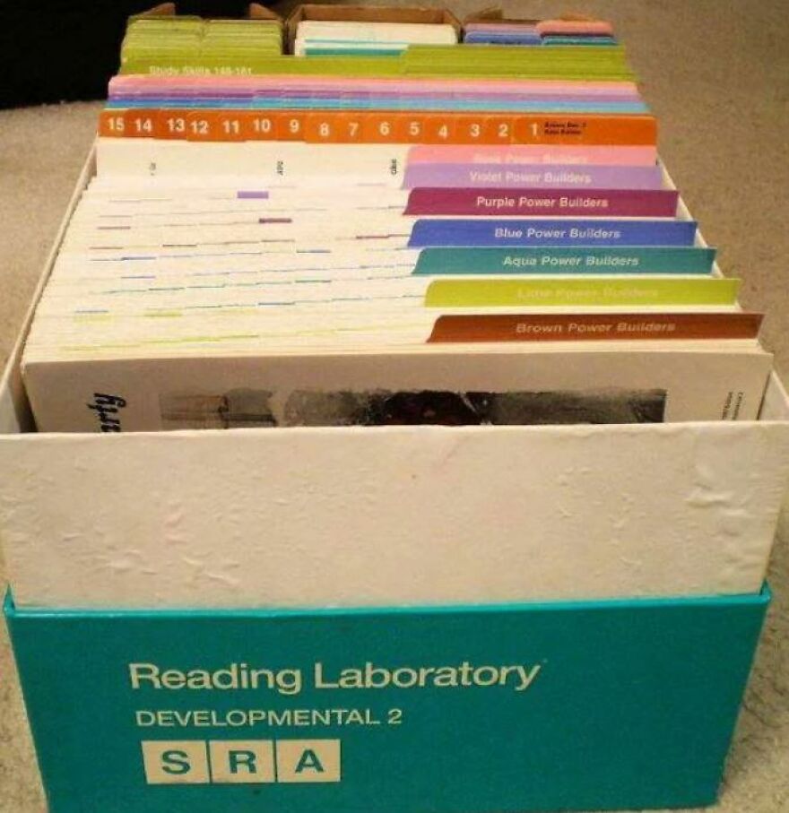 A vintage SRA Reading Laboratory kit with colorful numbered and tabbed booklets. Takes you down memory lane.
