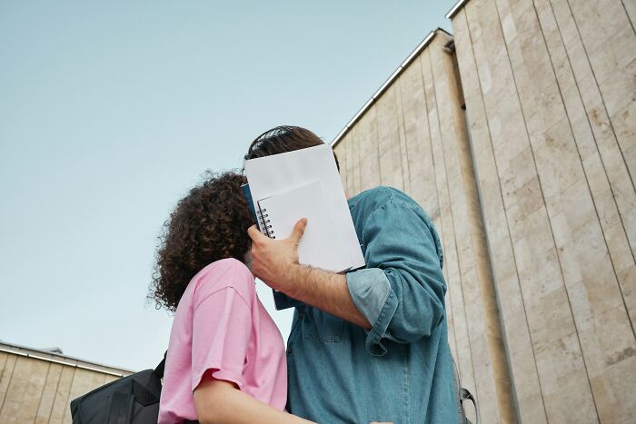 Two people sharing a moment outdoors, with intuition and connection as the central focus of the image.