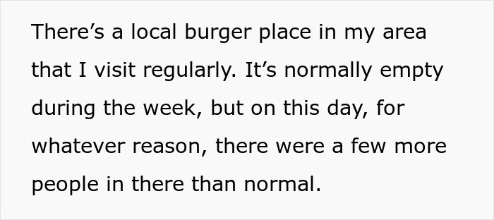 Text excerpt describing a local burger place that is usually empty but busier than normal on one day.