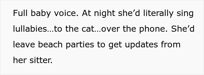 Woman singing lullabies to her cat at night, choosing her pet over social life and romantic relationships.