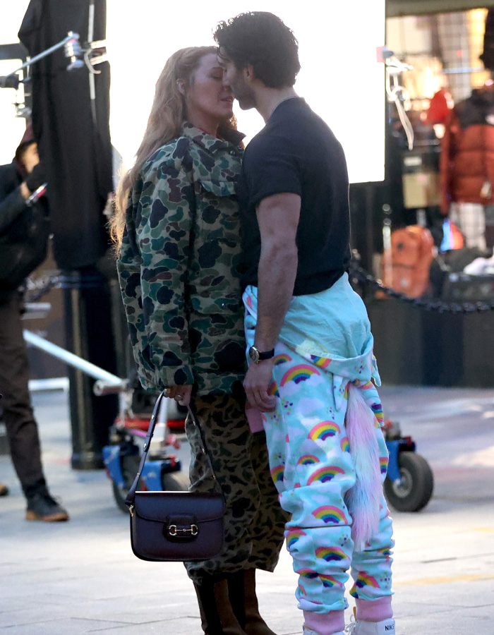 Blake Lively and co-star sharing a close moment on set, capturing intensity of She Lost Her Dragon scenes.