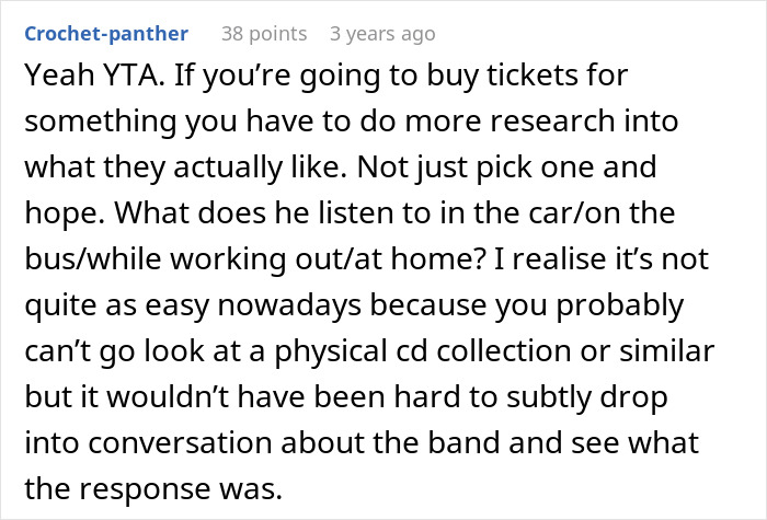 Screenshot of a Reddit comment discussing buying concert tickets as a gift for someone who loves bands and music preferences.