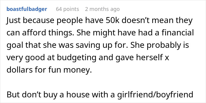 Screenshot of a Reddit comment discussing a woman hiding $50K savings while her boyfriend was upset about financial pretenses.