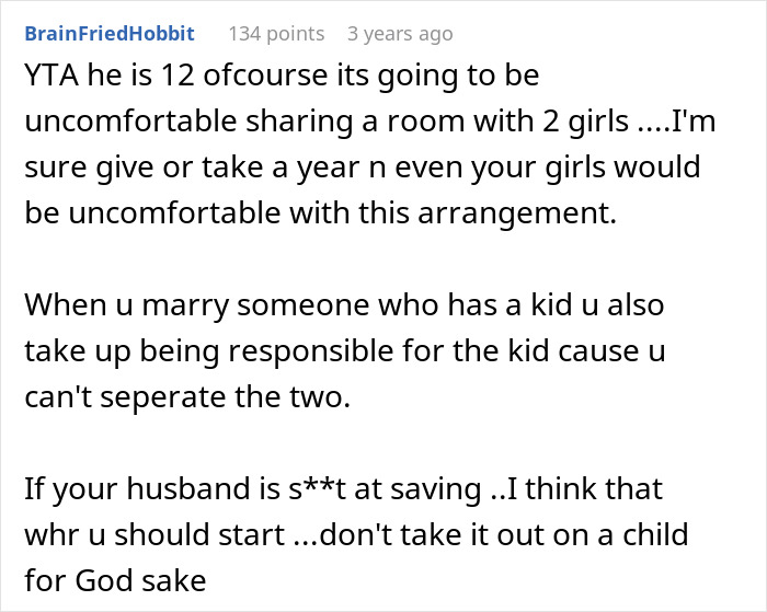 Reddit comment discussing family vacation discomfort and responsibility for a stepson excluded from the trip.