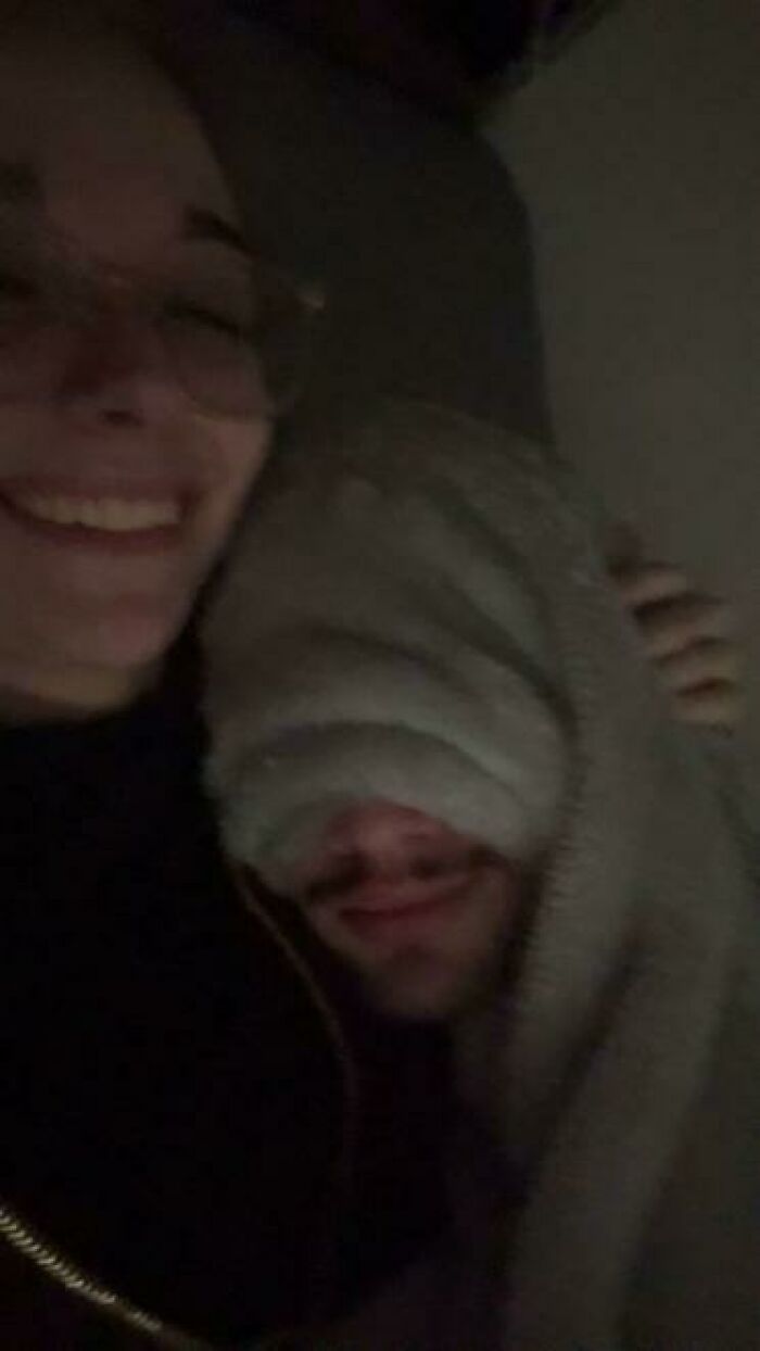 Two people caught sleeping in unhinged ways, one with a blanket covering their face and the other smiling nearby.