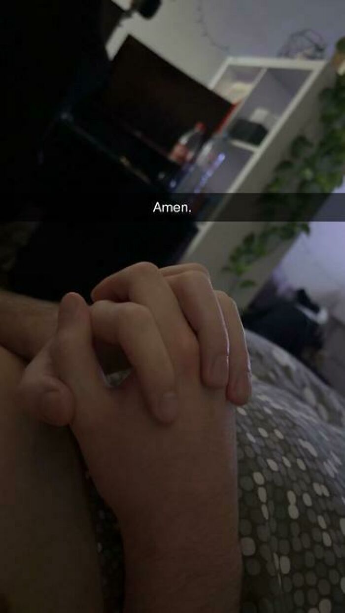 Close-up of hands clasped together in a sleeping setting, illustrating people caught sleeping in hilarious ways.