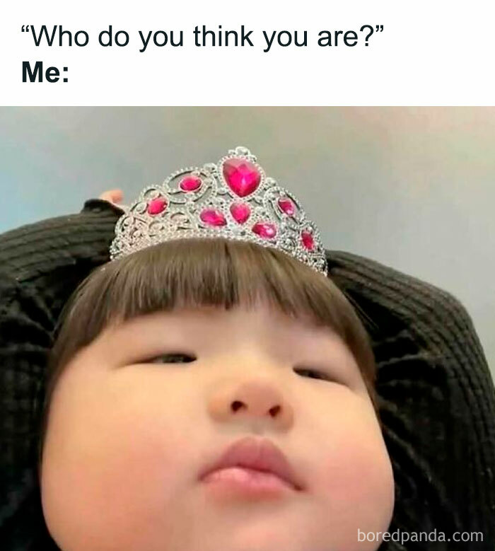 Close-up of a child wearing a jeweled crown expressing confidence, perfect for meme scrolling fun and chuckles.