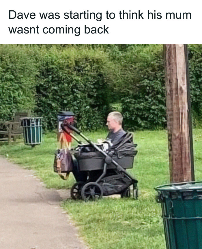 Man sitting in a baby stroller in a park, creating a funny and lighthearted meme for safe-for-work content.