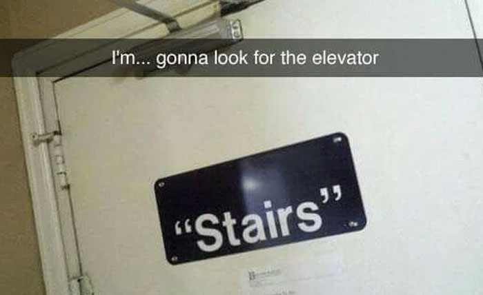 Humorous photo of a door labeled stairs with a caption about looking for the elevator, showing safe-for-work memes.