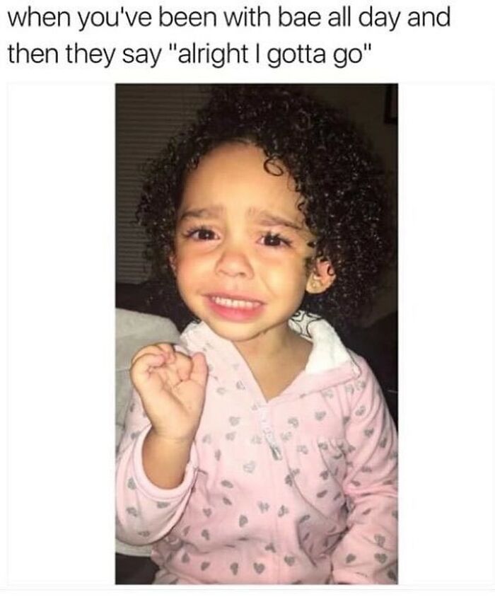 Toddler girl in a pink heart pajama making a sad face illustrating funny romantic relationships meme.