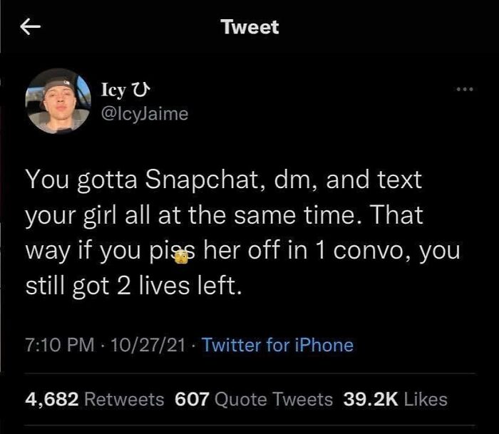Tweet about managing multiple conversations with a girlfriend on Snapchat and text, highlighting humorous romantic relationships memes.