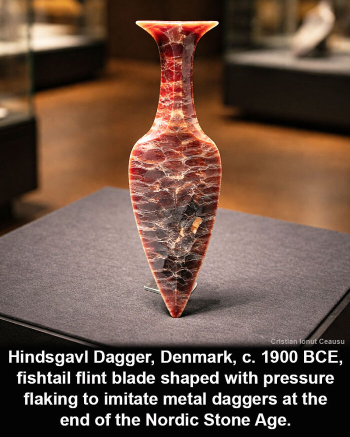 Historical marvel Hindsgavl Dagger from Denmark, a finely crafted flint blade shaped to resemble metal daggers.