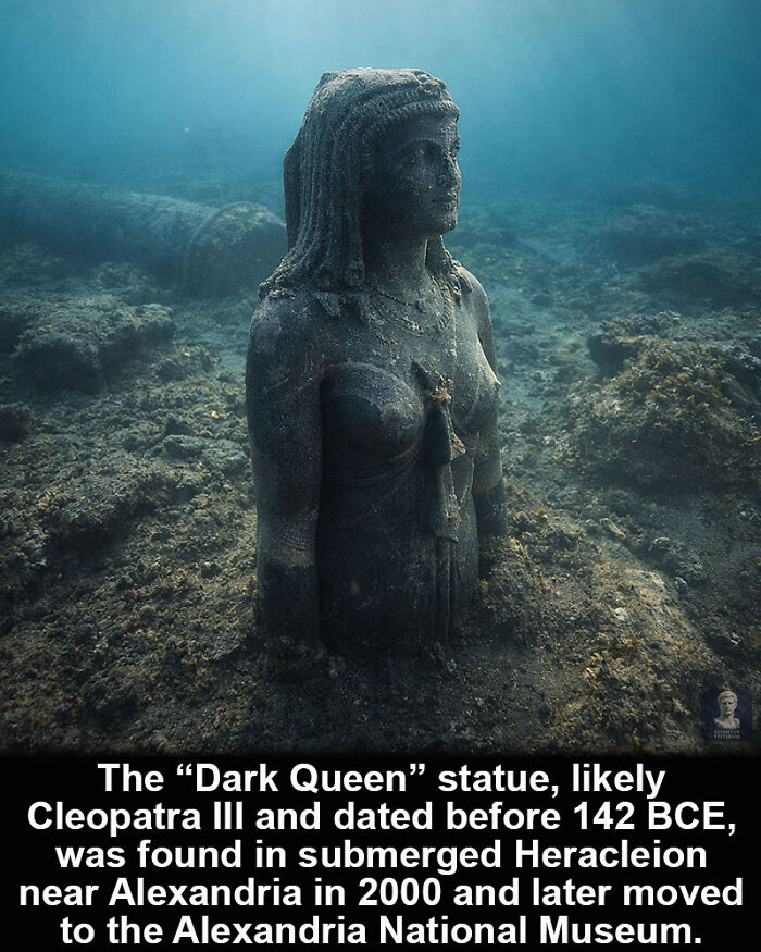 Underwater historical marvel statue of the Dark Queen Cleopatra III in submerged ancient city near Alexandria.