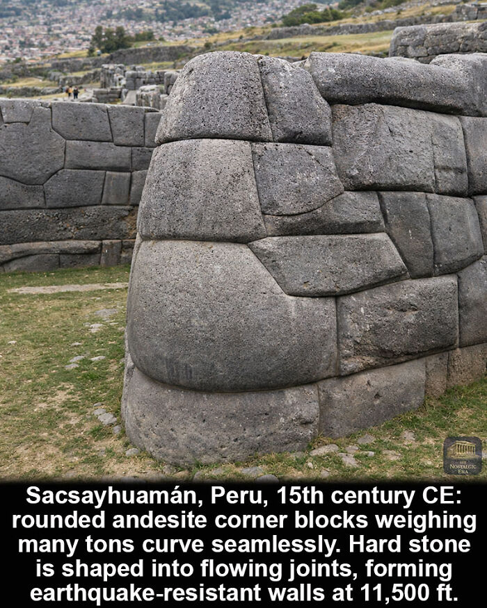 Rounded andesite corner blocks at Sacsayhuamán form earthquake-resistant historical marvel walls in Peru.