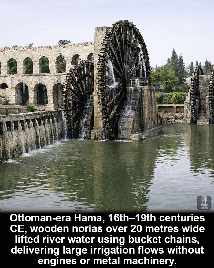 Wooden norias in Ottoman-era Hama lifting river water, a historical marvel of ancient irrigation technology.