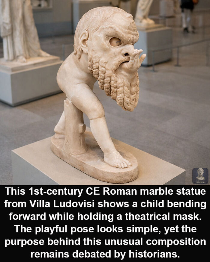 Roman marble statue from 1st century CE showing unique theatrical mask in playful pose, an intriguing historical marvel.