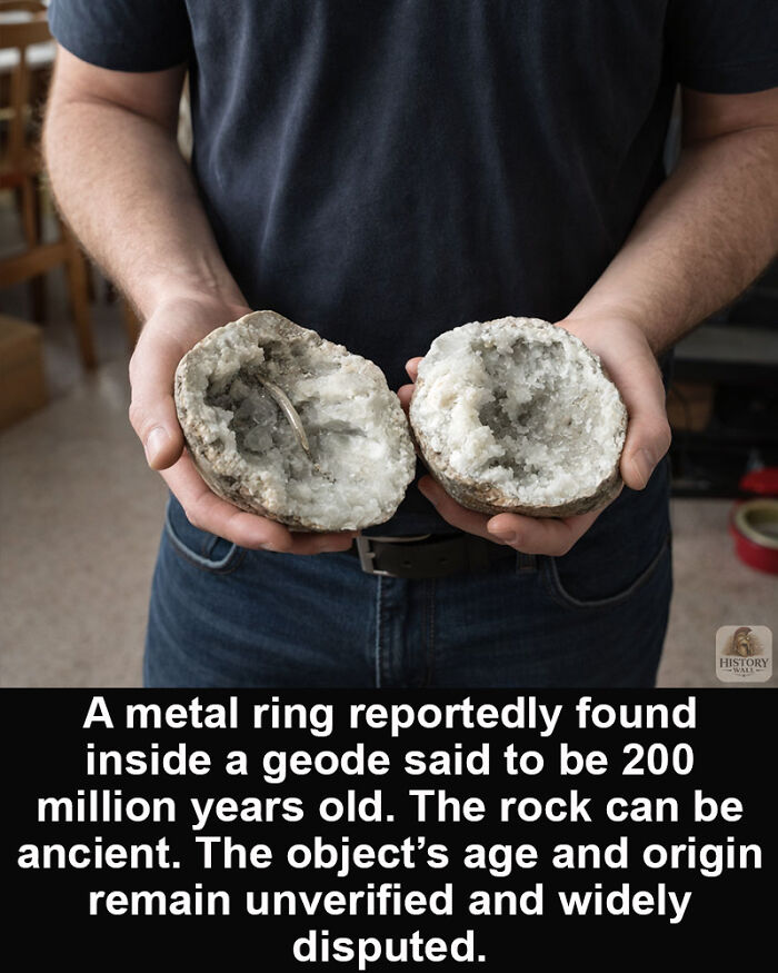 Person holding an ancient geode reportedly containing a metal ring, a historical marvel sparking debate and amazement today.