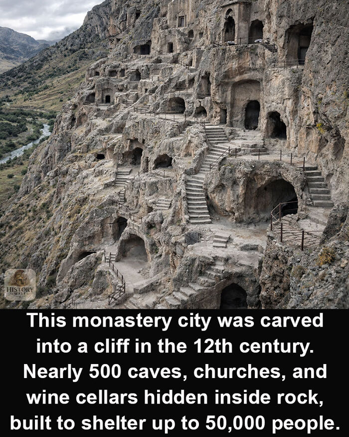 Monastery city carved into cliff with caves and churches, a historical marvel surviving from the 12th century.