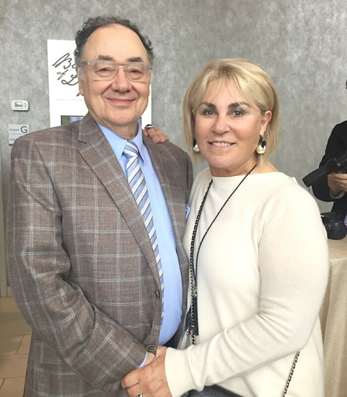 Older man and woman posing together indoors, representing creepy and mysterious things people lose sleep over.